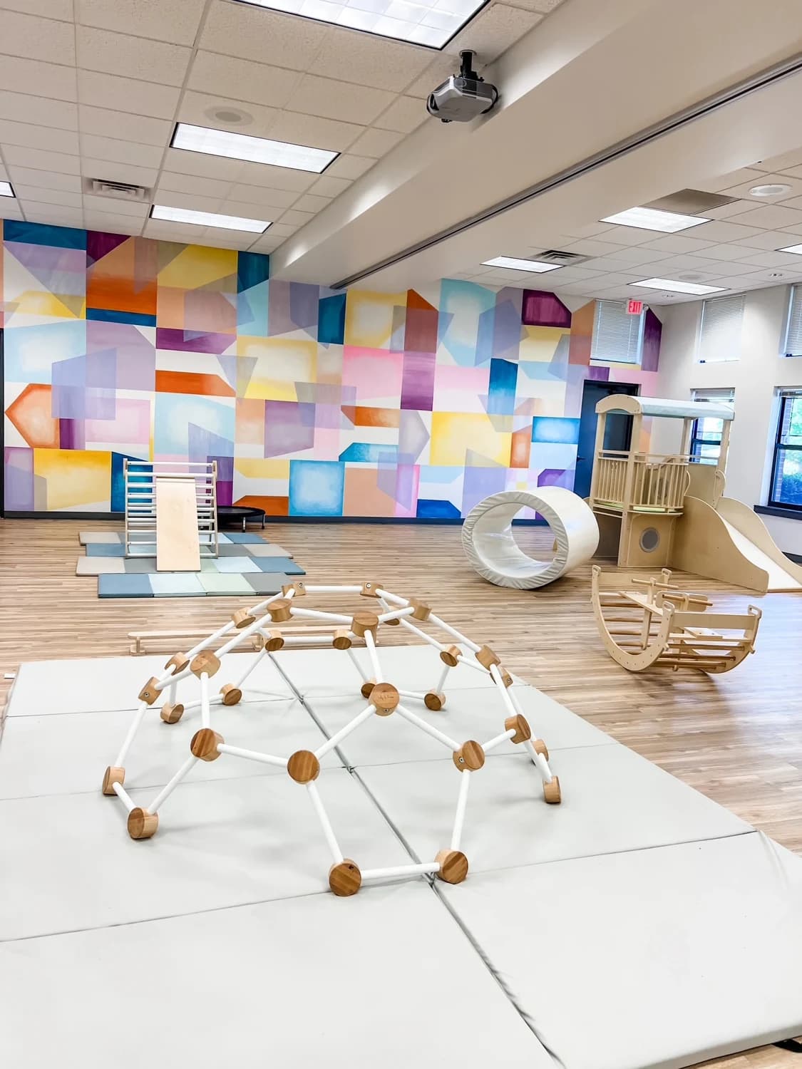 Open gross motor room with play equipment at Latitude’s Bridgeton center