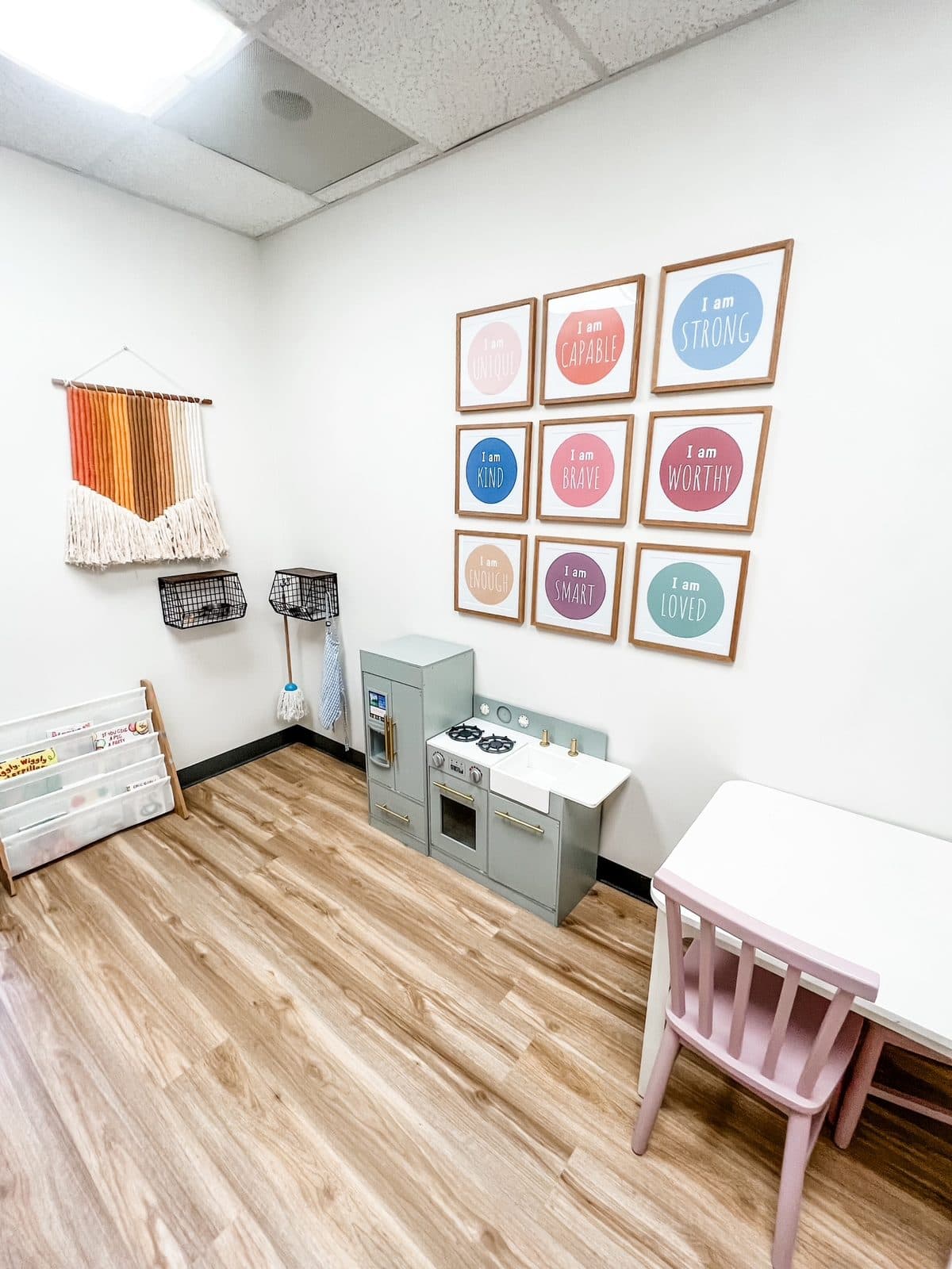 Assessment room with a play kitchen and small table at Latitude's Bridgeton ABA center